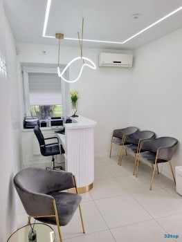 Сеть стоматологических клиник ОРАНЖДЕНТ на Беланова